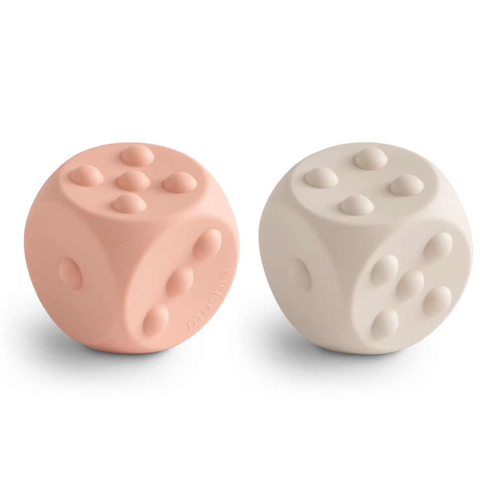 Colorful Dice Press Toy for babies, promoting sensory play and fine motor skills development.