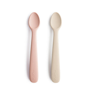 Silicone feeding spoons for babies, angled view showcasing soft, safe design for easy feeding.
