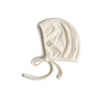 Ribbed baby bonnet in soft fabric, perfect for keeping little heads warm and stylish.
