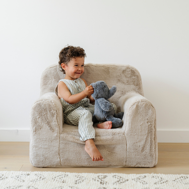 Cozy SNUGGLE UP CHAIR for kids, perfect for playtime and relaxation in any child's room.