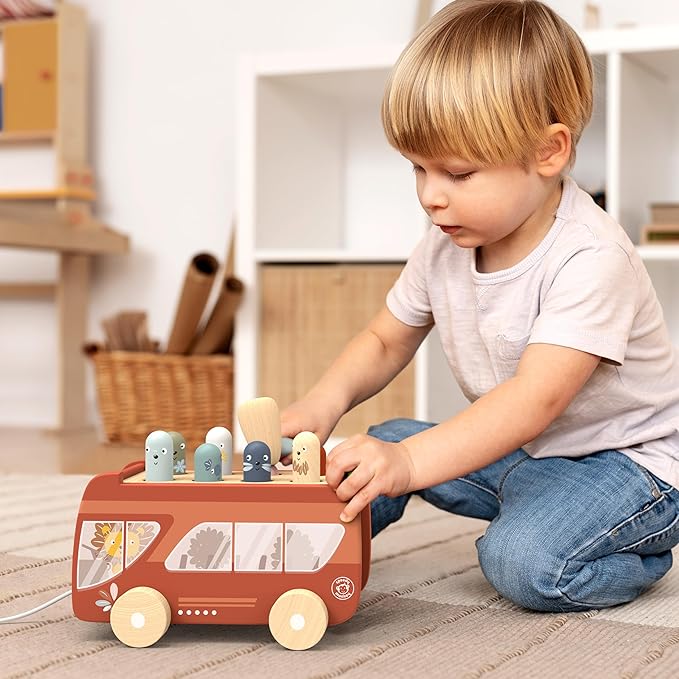 "Bus Pounding Bench for babies - engaging early learning toy for motor skills development."