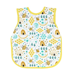 "Busy Bees Bapron for babies, angle view showcasing vibrant design and practical features for mealtime messes."