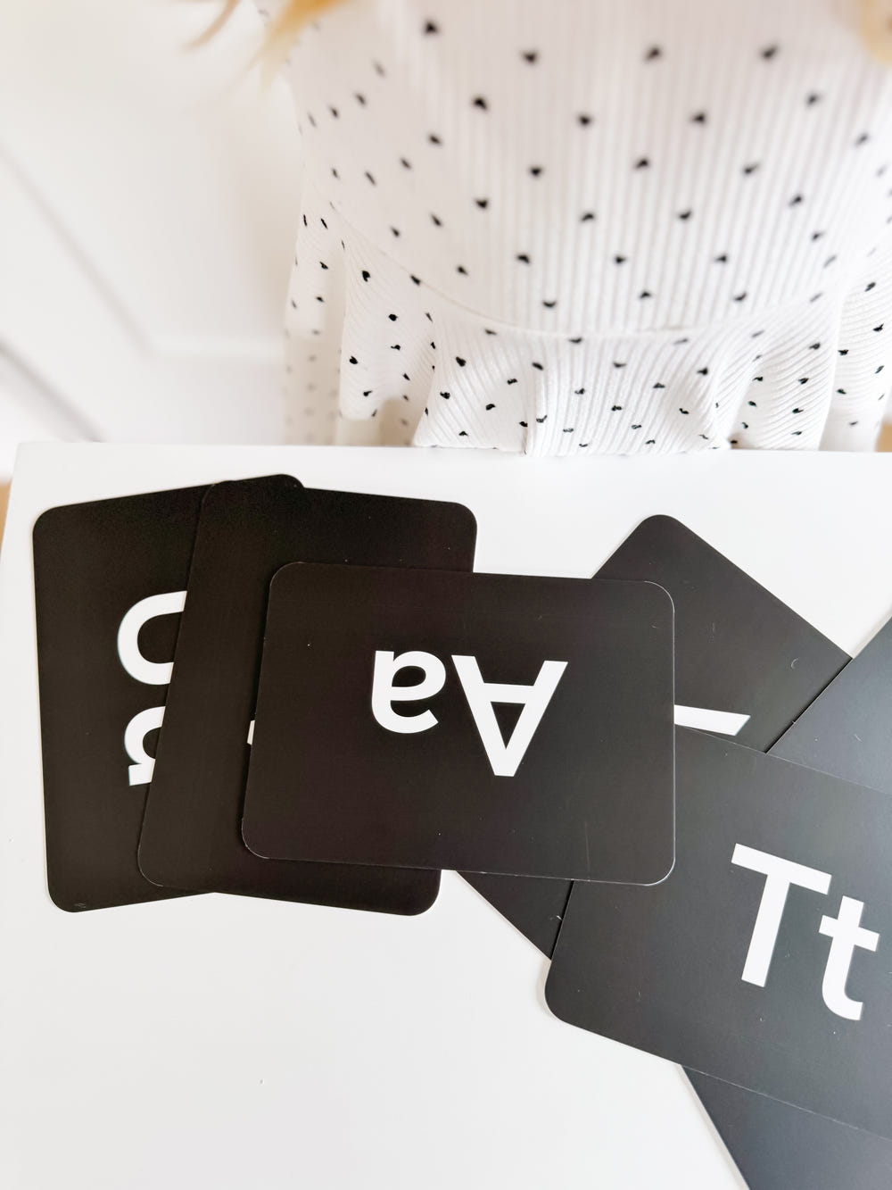 Black and white letter flashcards for early learning and sensory play, perfect for babies and toddlers.