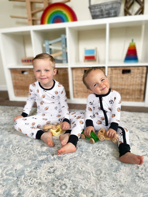 Dream Team Set sleepsuits and pyjamas for babies, showcasing cozy and stylish designs from angle 5.