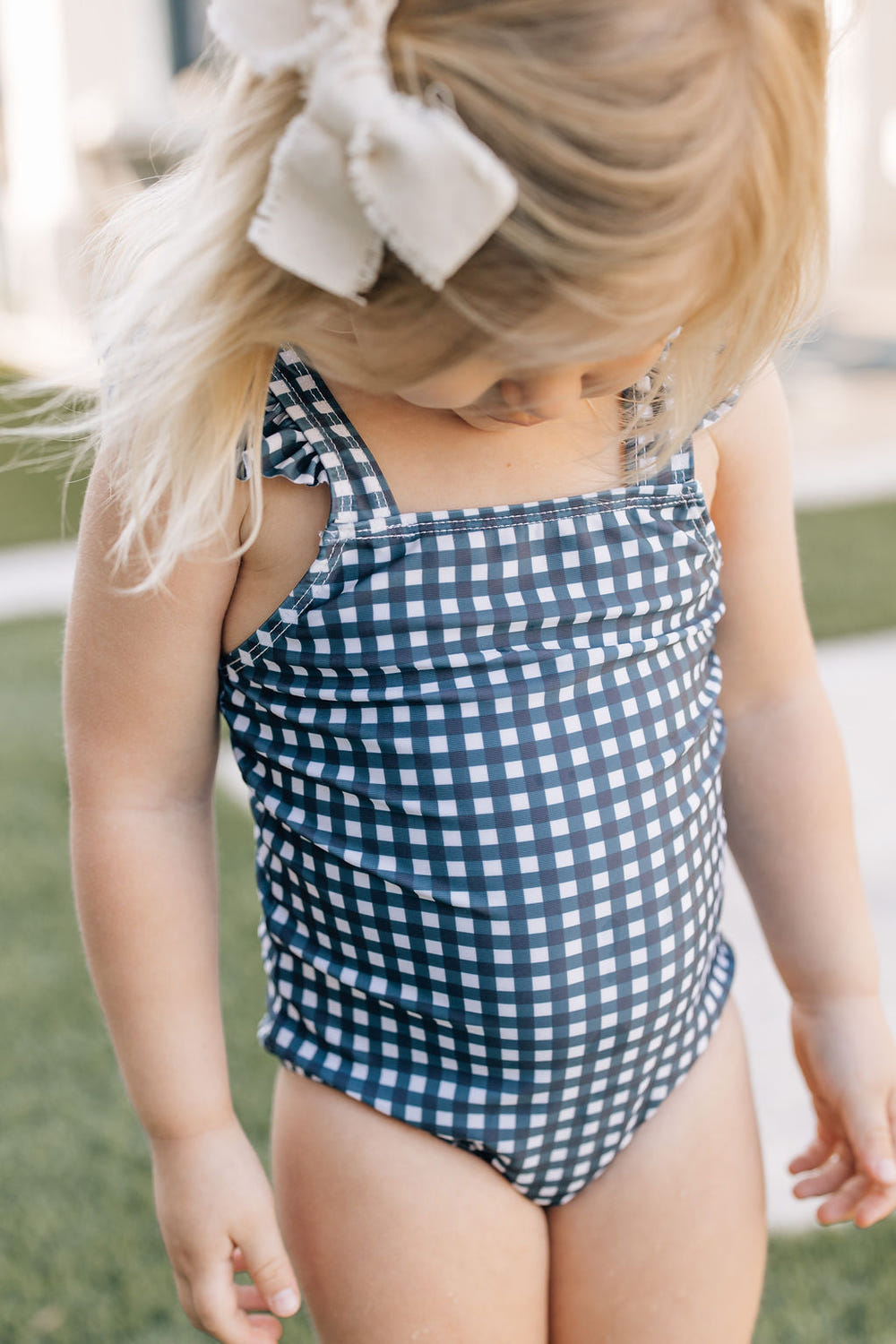 Navy gingham one-piece for babies, perfect for playtime and comfort in toys & entertainment.
