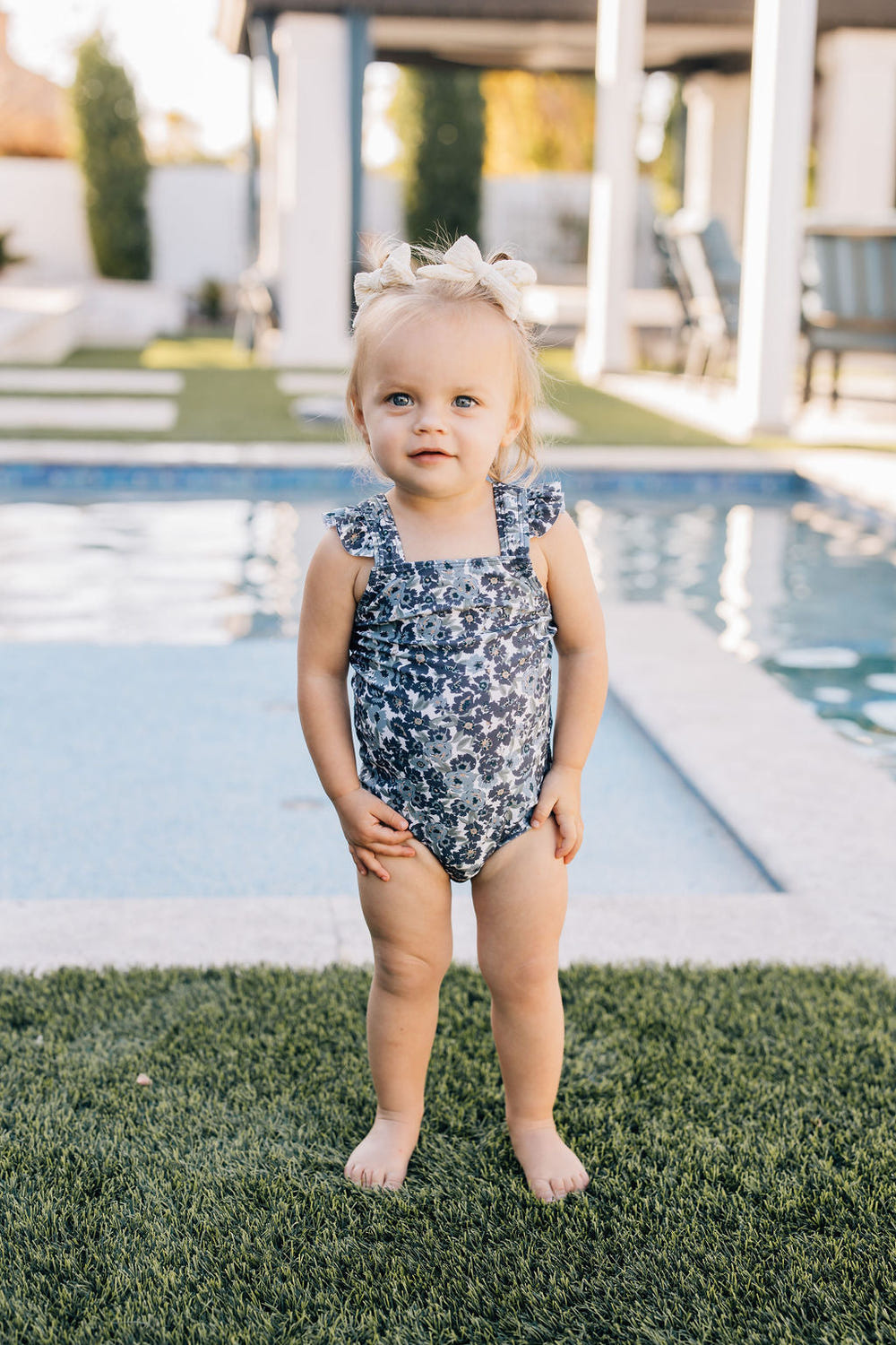 Liberty Floral One-Piece for babies, featuring a charming floral design, perfect for playtime and comfort.