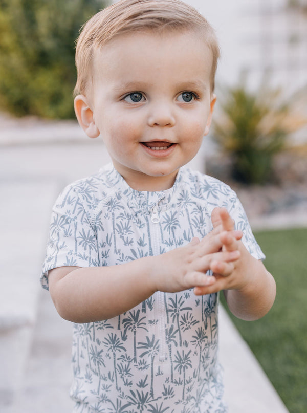 Palm Tree Zipper Swimsuit for babies, stylish and functional, showcased from angle 4. Perfect for summer outings!