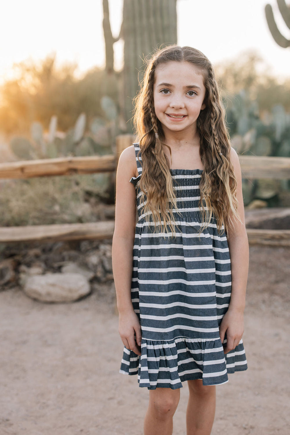 Baby stripe linen dress in soft fabric, perfect for summer outings and stylish comfort.