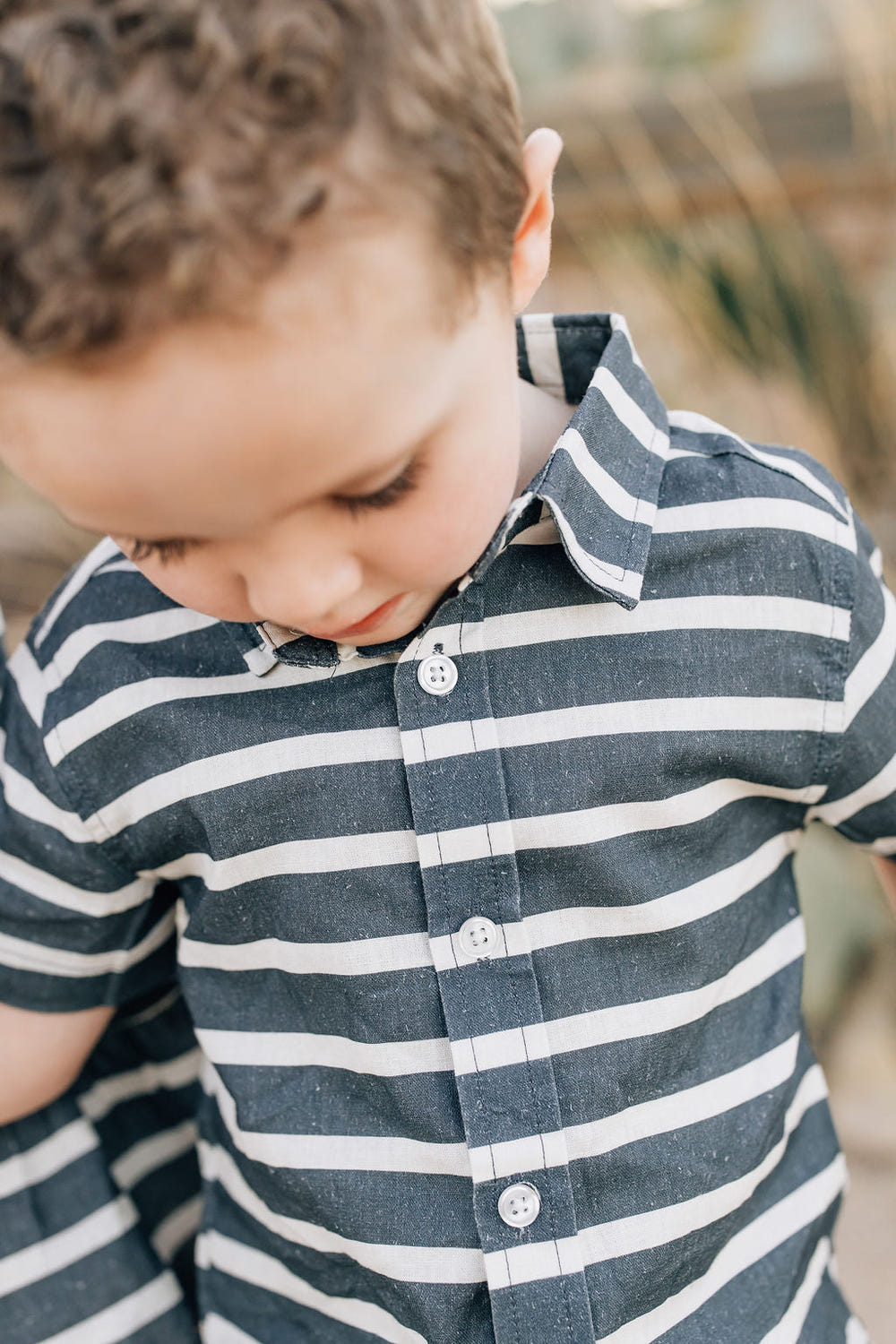 Baby stripe linen button-up shirt, perfect for stylish and comfortable dressing.