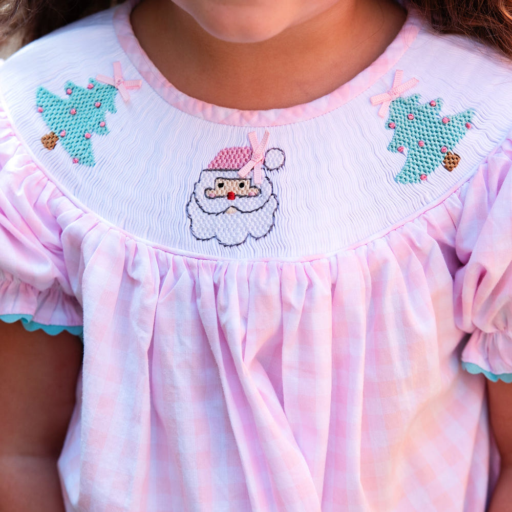 Smocked Christmas dress for girls, perfect holiday outfit with festive design and comfortable fit.