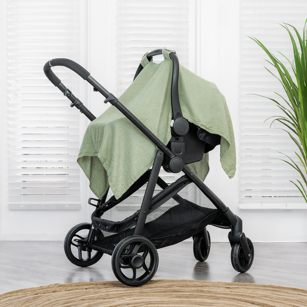 Sage baby car seat cover for stylish and comfortable travel. Perfect fit for safety and protection.