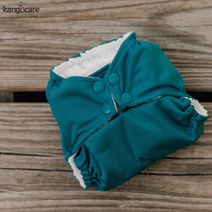 Rumparooz Caribbean One Size Cloth Diaper Cover at angle 7, perfect for eco-friendly baby bedding and sleep solutions.