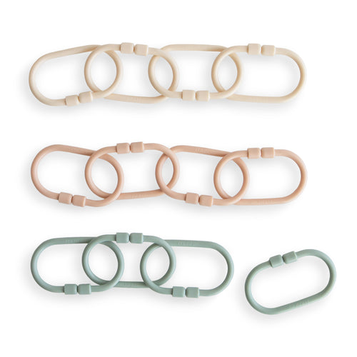 Colorful chain link rings for stroller toys, promoting sensory play and motor skill development for babies.