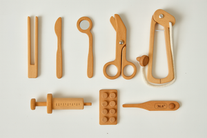 Wooden Doctor Pretend Play Set for kids, featuring Montessori medical tools, displayed from angle 2.