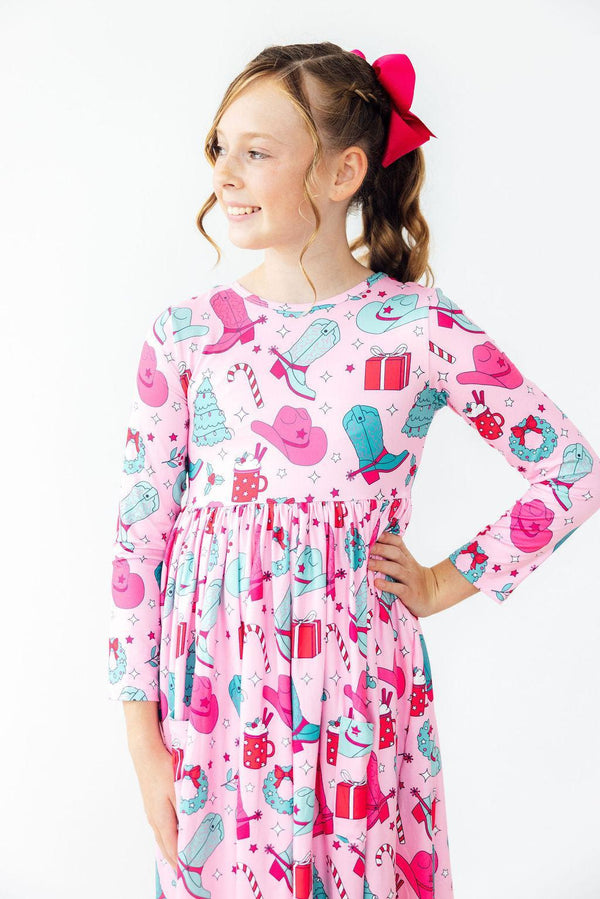 Christmas Cowgirl L/S Pocket Twirl Dress for girls, featuring a playful design and twirl-friendly skirt.