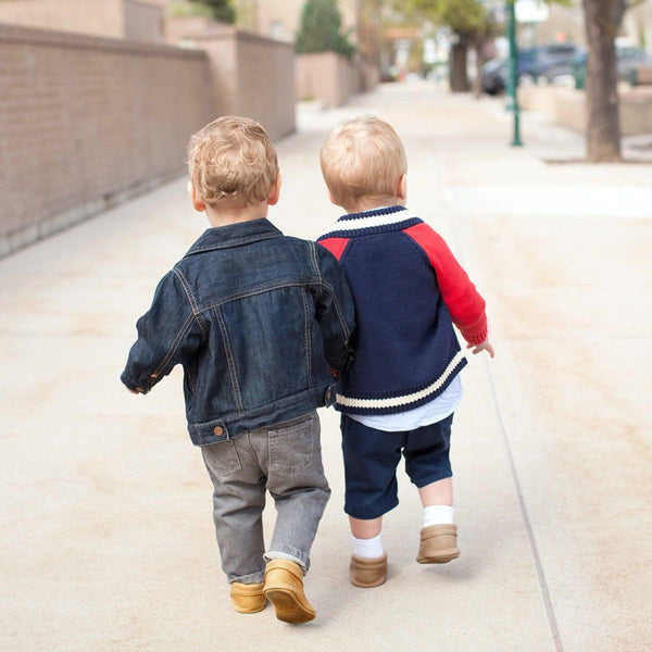 Weathered brown city baby shoe, angle 5 view, stylish and comfortable city mocc for little ones.