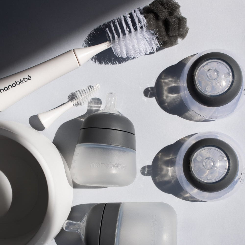 Complete baby bottle feeding set in a stylish gift box, perfect for new parents.