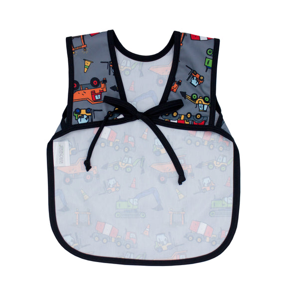 Construction Zone Bapron for babies, featuring a playful construction theme, angled view showcasing its design and functionality.