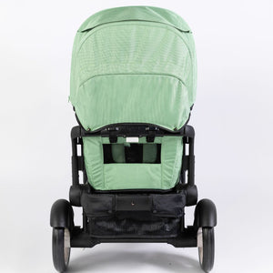Stroller wagon "The Wagon - Spring Fern" shown at angle 4, featuring a stylish design and spacious seating for babies.