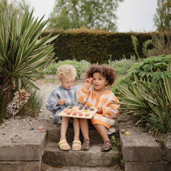 Colorful wooden alphabet puzzle pieces arranged at an angle, perfect for early learning and play.