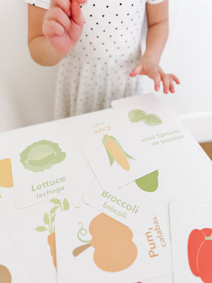 "Colorful vegetable flashcards for babies, promoting learning and fun in a stylish furniture setting."