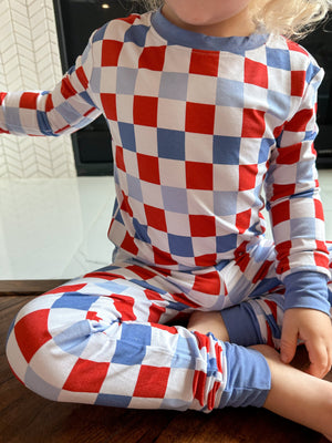 RWB Check Set for babies, cozy bedding and sleep essentials in a stylish check pattern, viewed from angle 2.