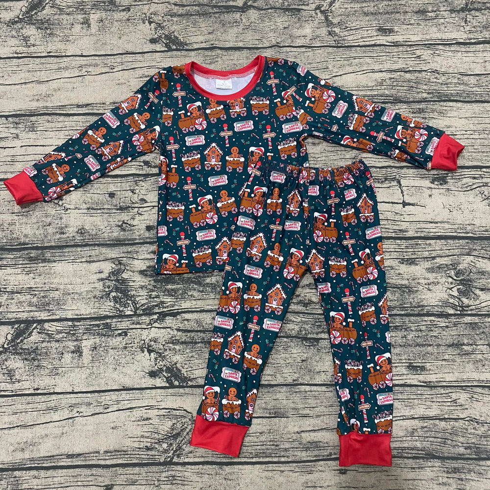 Gingerbread house PJ set for babies, cozy sleepsuit perfect for festive bedtime.