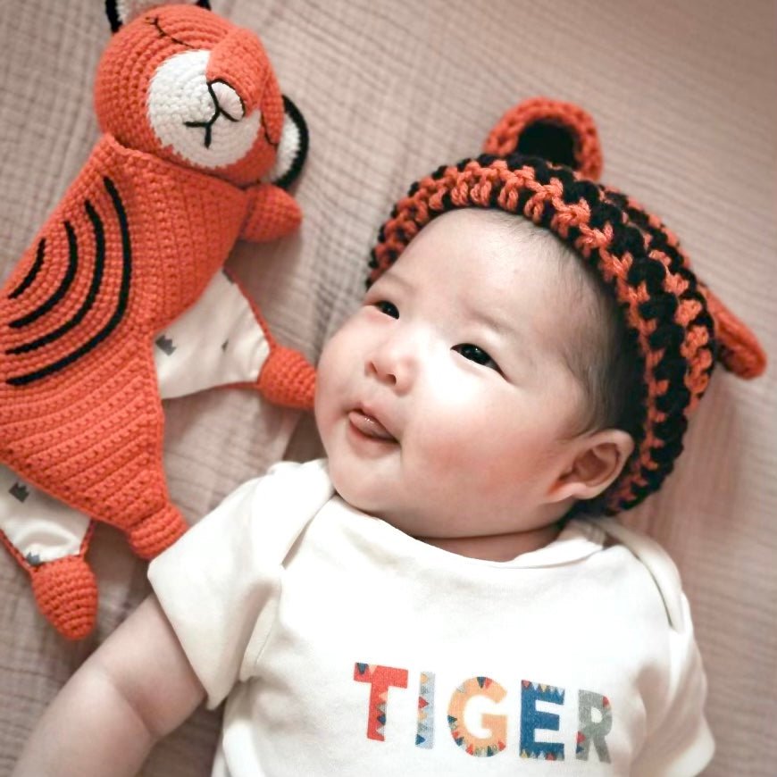 Tiger graphic short sleeve bodysuit for babies, perfect for playful and stylish outfits.