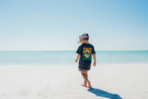 Baby Shark Bite T-Shirt in playful design, perfect for toddlers' fun and comfort. Angle view showcasing vibrant colors.
