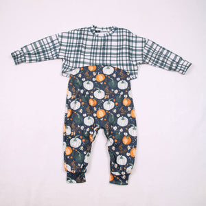 Fall pumpkins honey Ollie romper with snaps, perfect for babies, displayed at an angle.