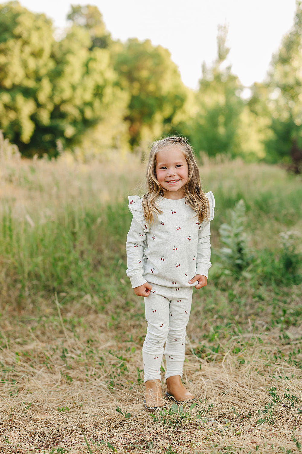 Cherry Ruffle French Terry Set for babies - stylish two-piece outfit in soft fabric, perfect for comfort and play.