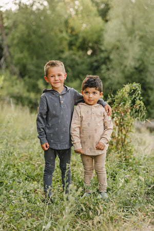 Cactus hooded baby set in two-piece bundle, featuring playful design and soft fabric, perfect for little ones.