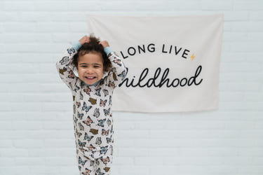 Social Butterfly Two-Piece Set for babies, cozy loungewear in vibrant colors, perfect for playtime and relaxation.