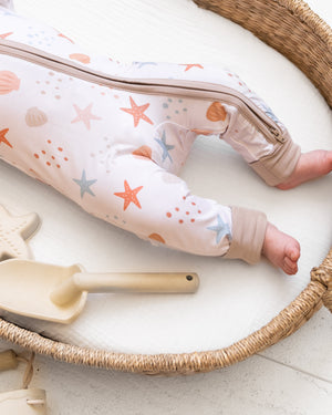 Sandy Toes Zipper Lounger for babies, cozy loungewear in a stylish design, angle view showcasing comfort and cuteness.