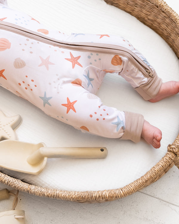 Sandy Toes Zipper Lounger for babies, cozy loungewear in a stylish design, angle view showcasing comfort and cuteness.