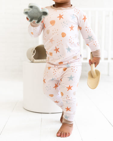 Sandy Toes Two-Piece Set for babies, cozy loungewear in soft fabric, perfect for playtime and relaxation.