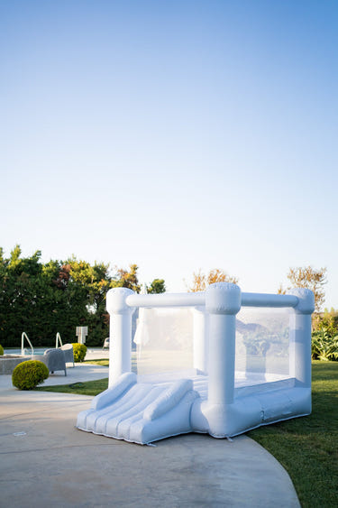 Mini Leo Muted Blue Bounce House for outdoor playsets, perfect for toddlers and kids to enjoy active fun.