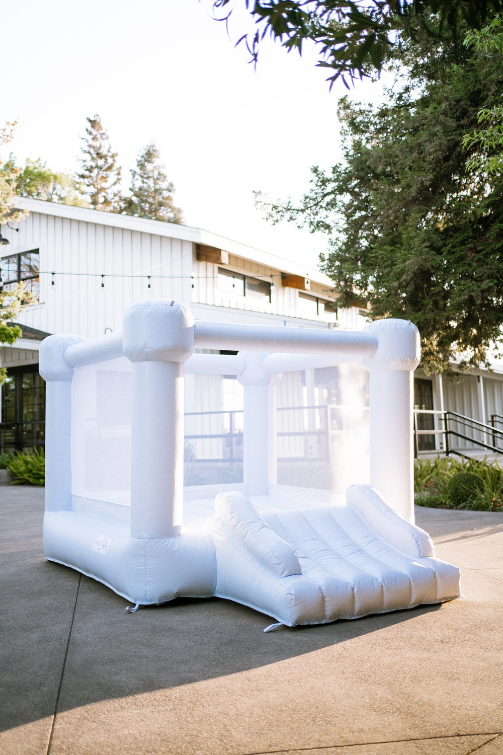 Mini Leo Muted Blue Bounce House for outdoor playsets, perfect for toddlers and kids to enjoy active fun.