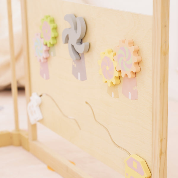 Wooden baby playpen with mirror and whiteboard, foldable 63"x63", Montessori sensory play yard, angle view.