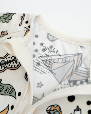 Camp Hugga Zipper Lounger for babies in cozy loungewear, shown from angle 3. Perfect for comfort and style.