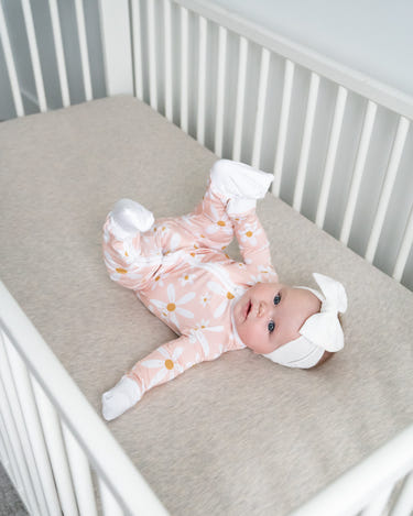 Cozy Make My Daisy Zipper Lounger for babies in soft fabric, perfect for lounging and comfort.