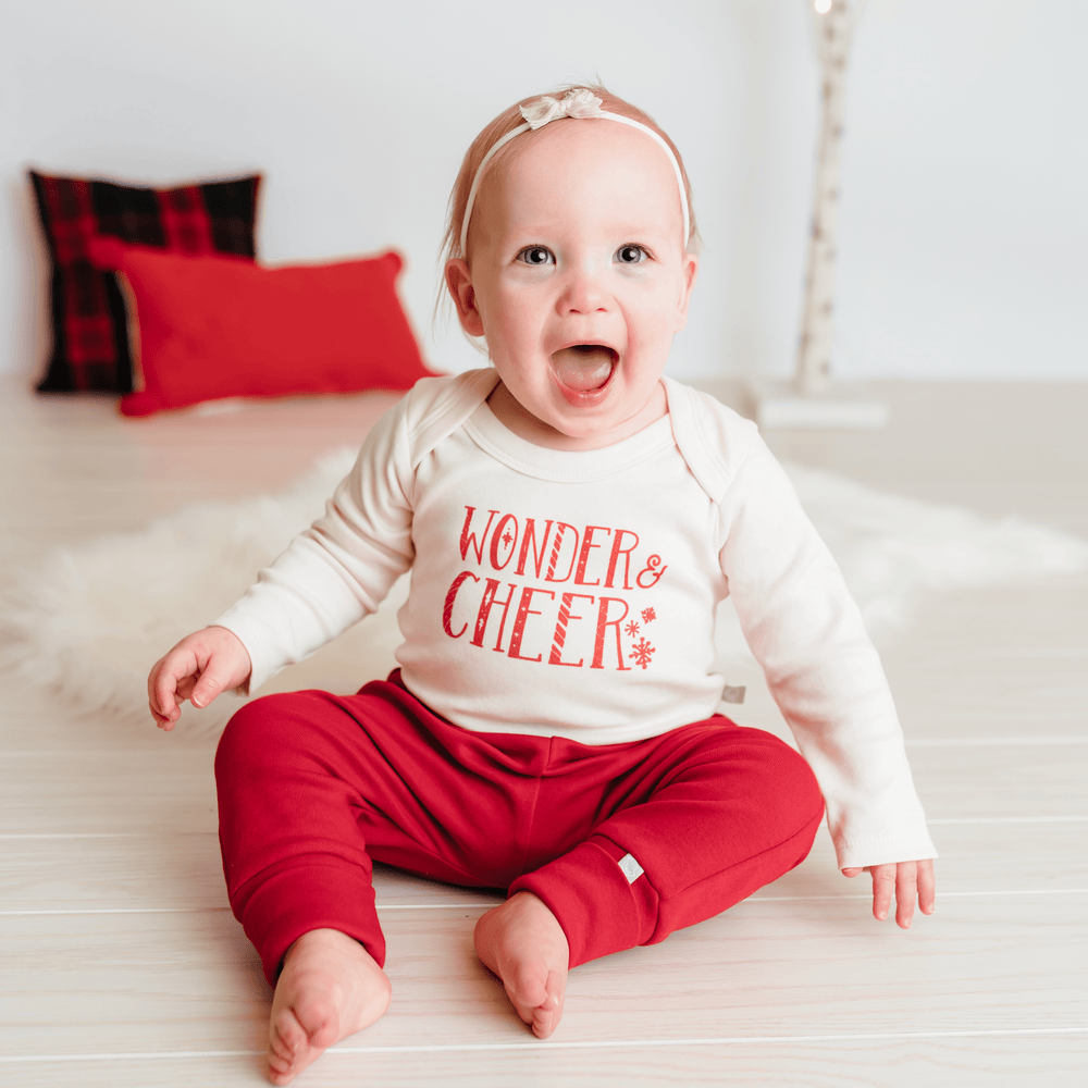 Long sleeve graphic bodysuit from Wonder and Cheer, perfect for stylish and comfortable baby outfits.