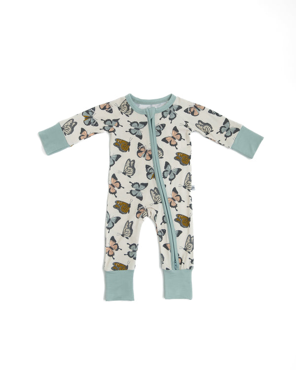 Social Butterfly Zipper Lounger for babies, cozy loungewear in playful design, shown from angle 2.