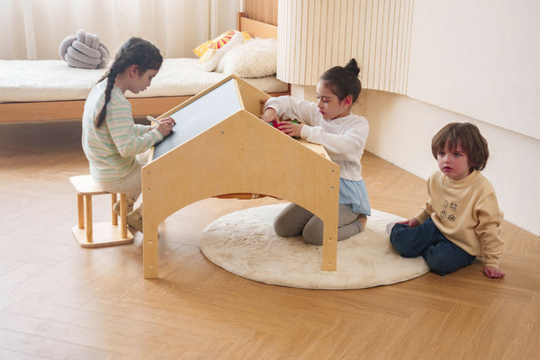 Ash Tent & Desk Set for kids, featuring a playful design in a cozy angle view. Perfect for imaginative play and study.