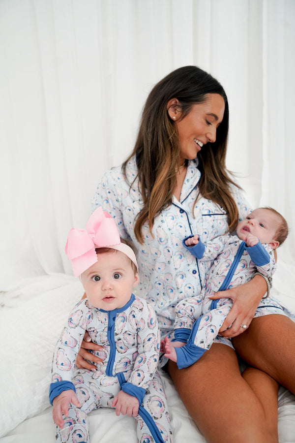 Blue Oysters Bamboo Sleeper pajamas for babies, shown from angle 3, featuring soft, breathable fabric in a charming design.