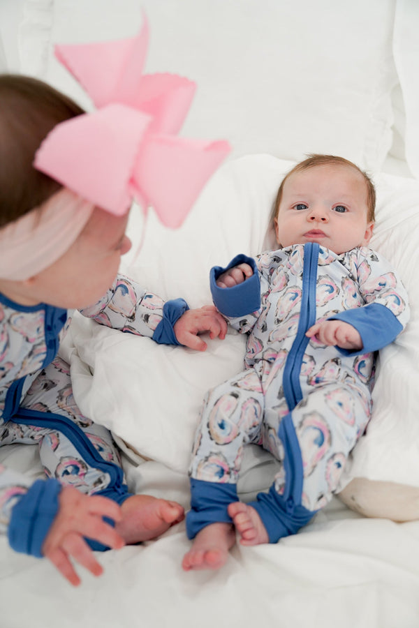 Blue Oysters Bamboo Sleeper pajamas for babies, angle view showcasing soft fabric and adorable design.