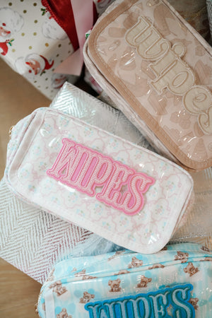 Clear coat wipes pouch travel bag, angled view, perfect for on-the-go baby care.