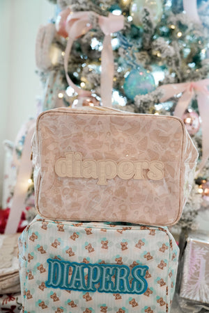 XL Diapers in a clear coat travel bag, angled view showcasing convenience and portability for parents on the go.