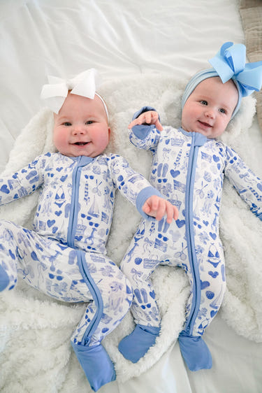 Blue Americana bamboo sleeper pajamas for babies, featuring a soft and cozy design in a charming blue pattern.