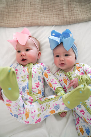 Bamboo Sleeper Bikinis for babies, cozy pajamas in soft fabric, angle view showcasing design and comfort.